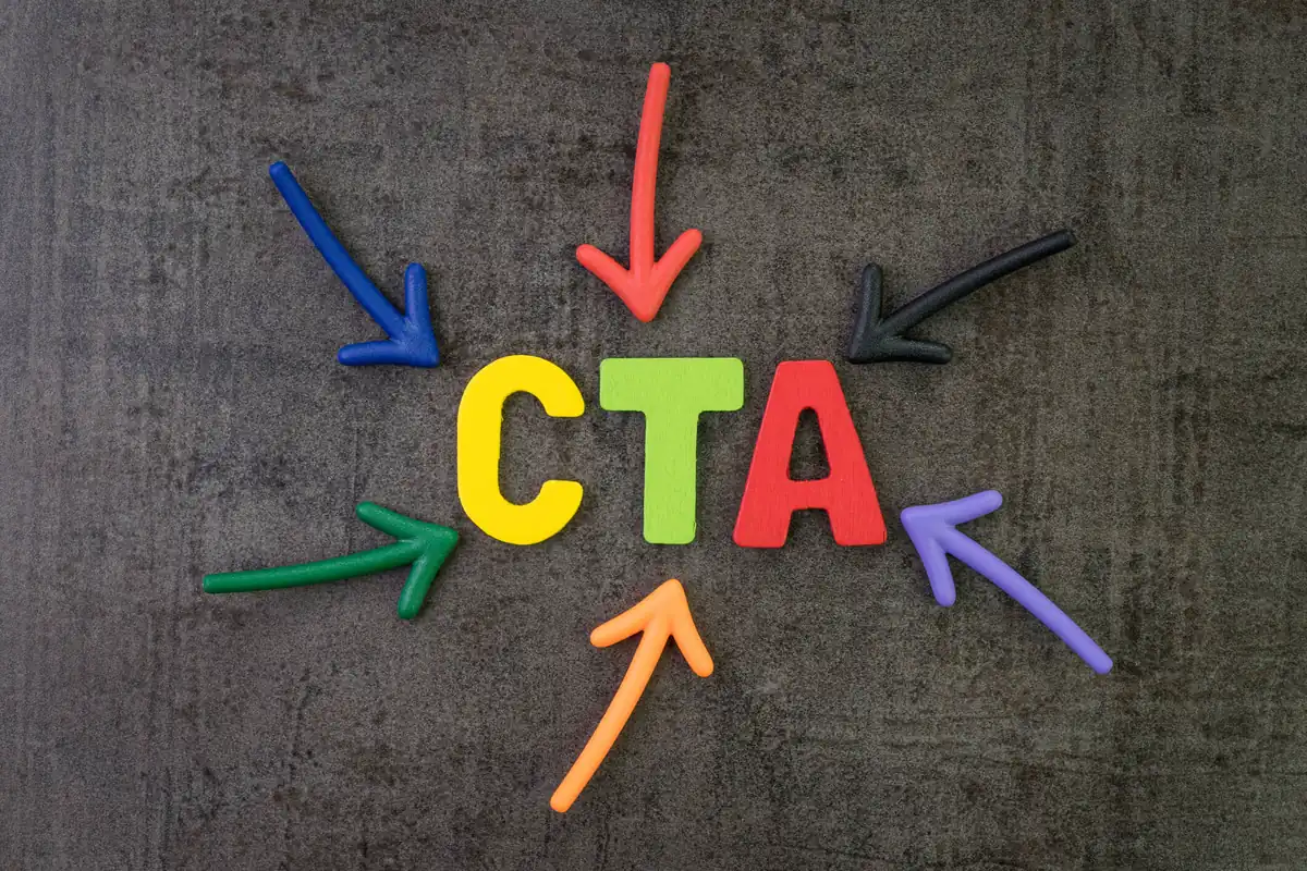 Colorful letters spelling CTA on a dark background, with arrows in various colors pointing to the word in the center