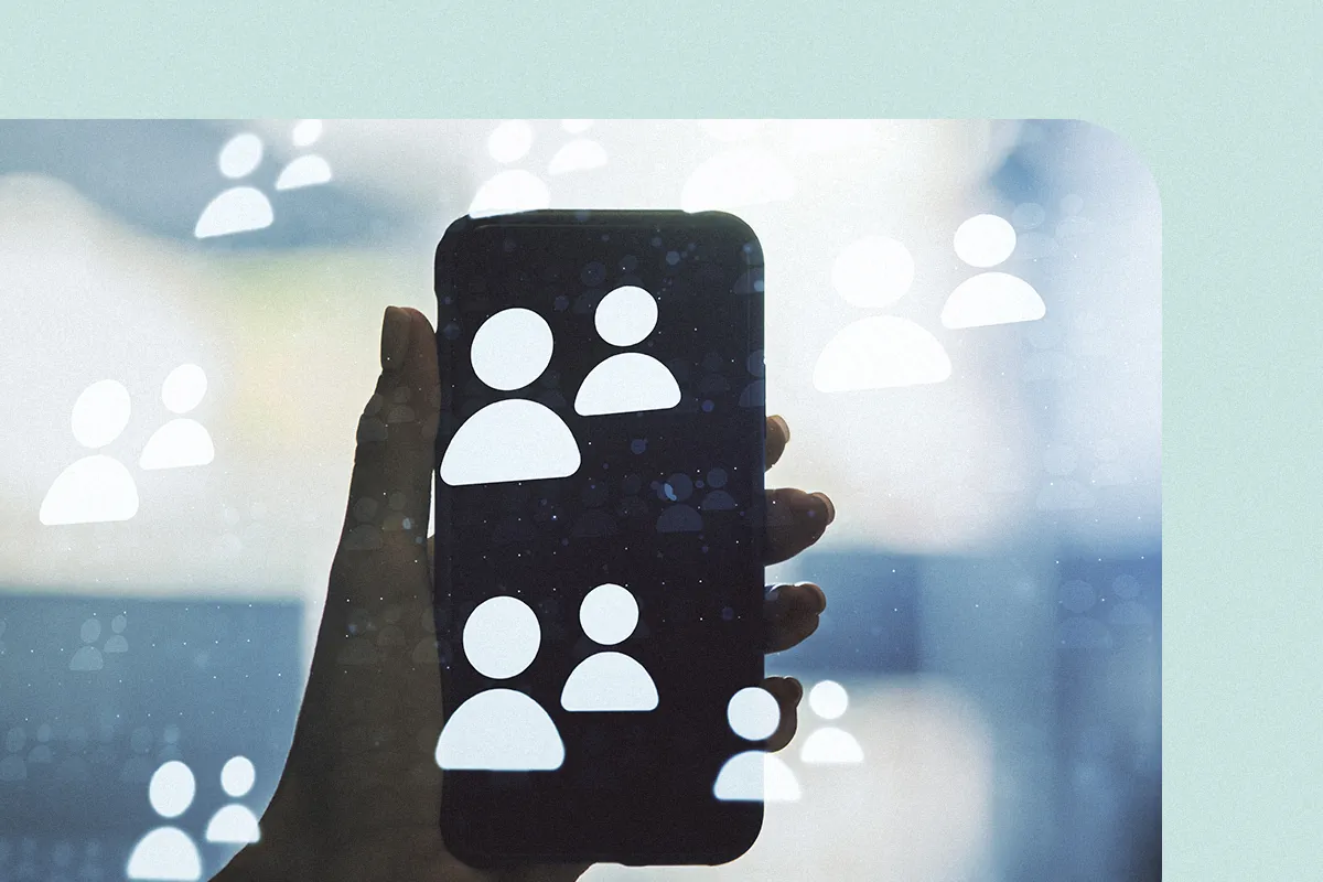 Hand holding a phone surrounded by white people icons, representing lead capture through the link in bio