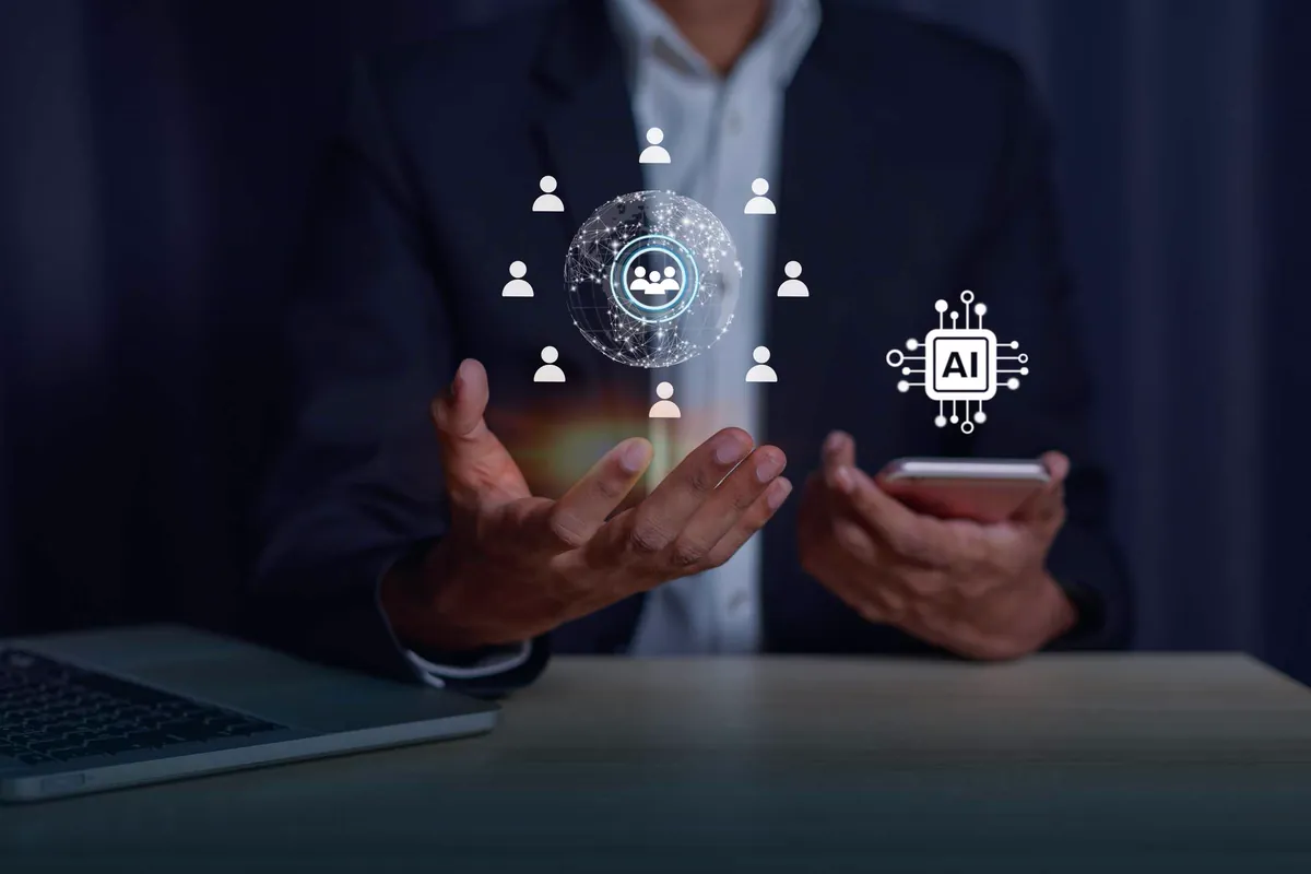 Person in a suit holding a phone next to an artificial intelligence chip and a digital globe surrounded by user icons